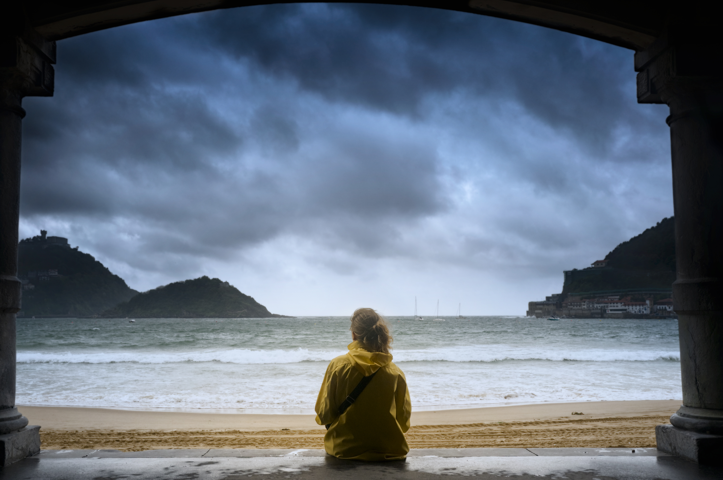 Woman looking out toward the ocean